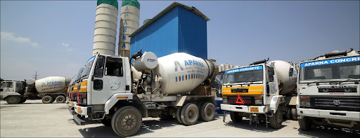 Aparna RMC concrete mixer trucks at plant site